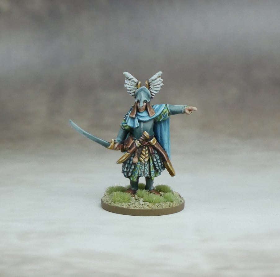 Prince Elarael of the House of Calaelendir standing with sword, dressed in Elven battle attire.