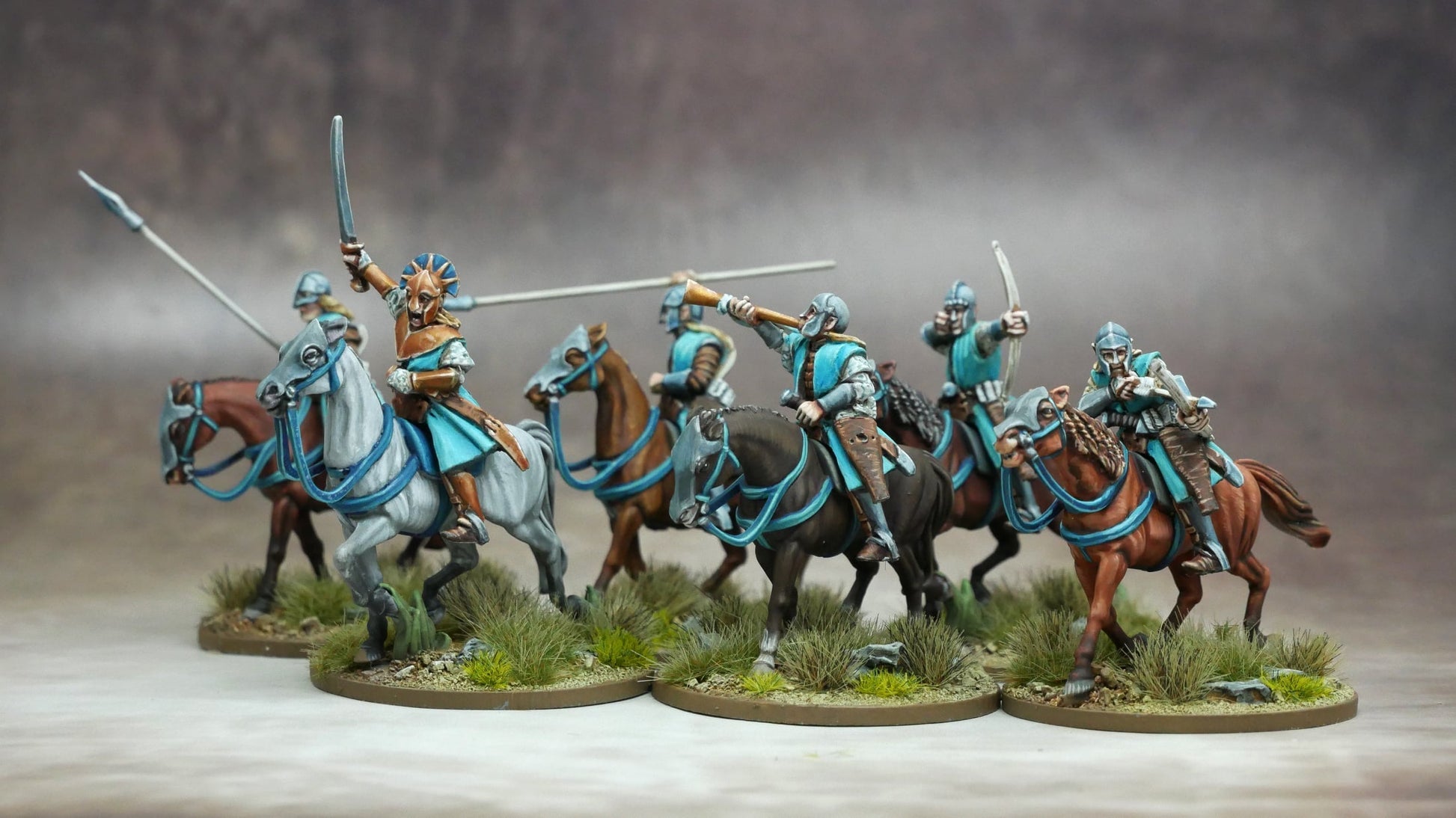 Elven Light Cavalry charging into battle, showcasing their agility and bond with their horses.