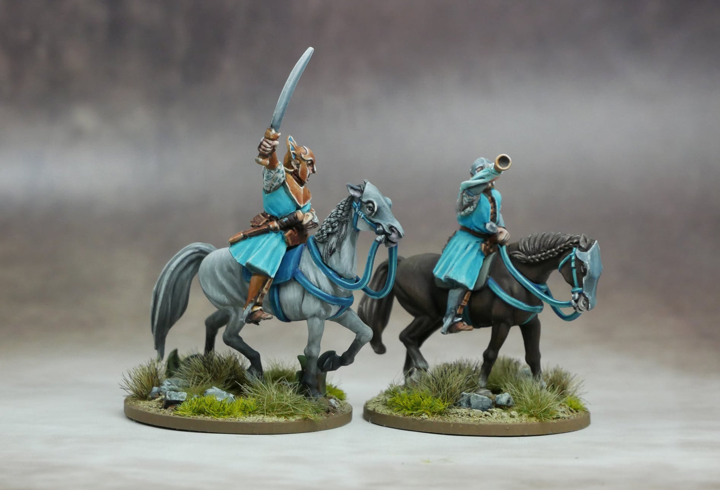 Elven Light Cavalry figures showing horse riders in action with swords and trumpet.