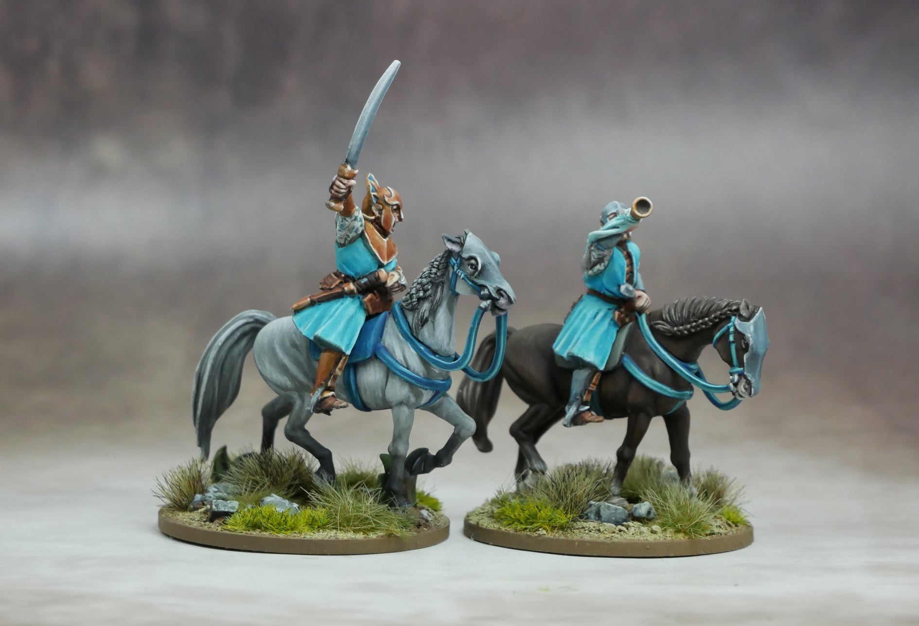 Elven Light Cavalry figures showing horse riders in action with swords and trumpet.